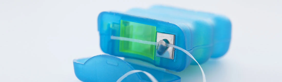 Dental Floss In A Blue Box