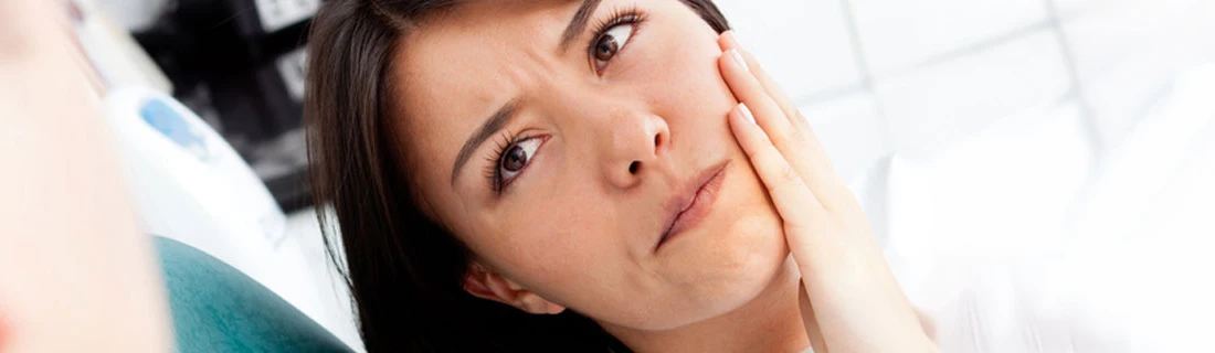 Woman At Dentist With Pain